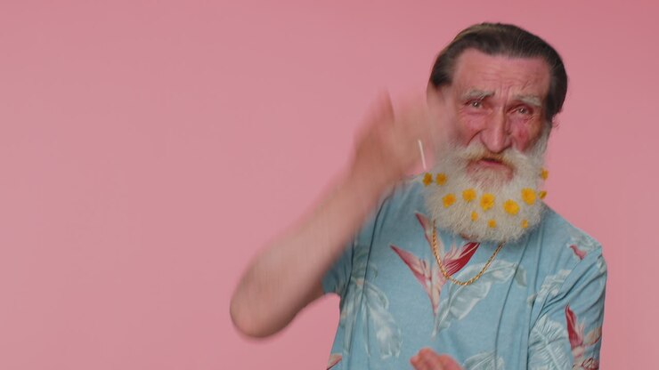 Upset disappointed sad senior old man wipes tears and cries from despair, depression, despair, loss