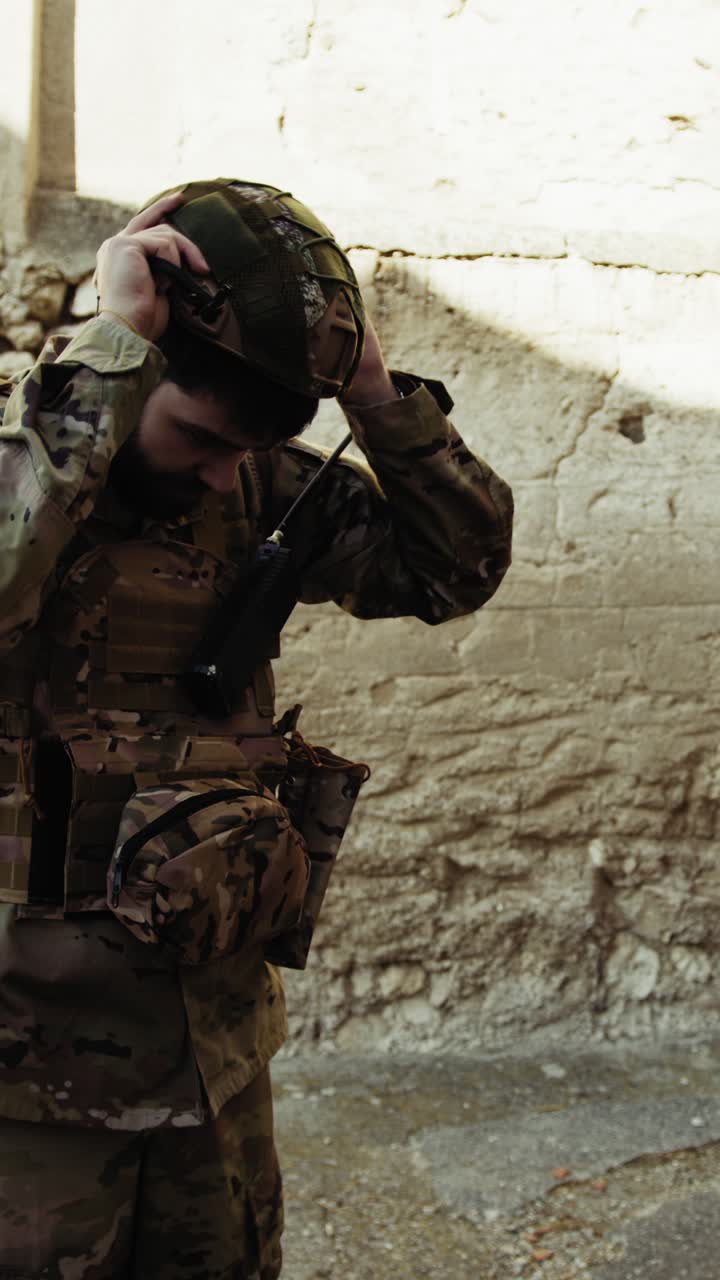 Soldier Puts On His Hat Before Scouting The Dangerous Area