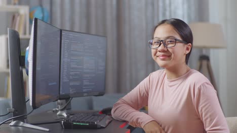 teenage girl studying computer science