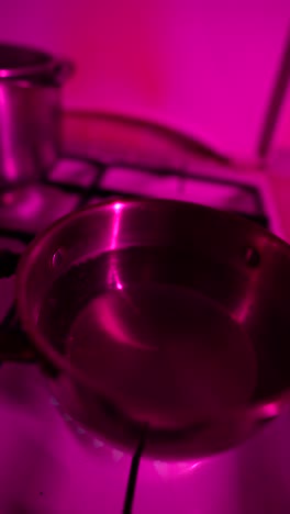 cooking on a pink lit stove