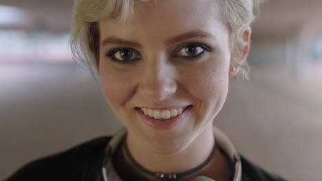 close up portrait of cute trendy woman student looking at camera smiling shy beautiful eyes