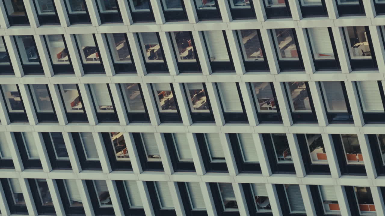 Modern Office Building Facade with Interior Reflections