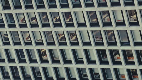 modern office building facade with interior reflections
