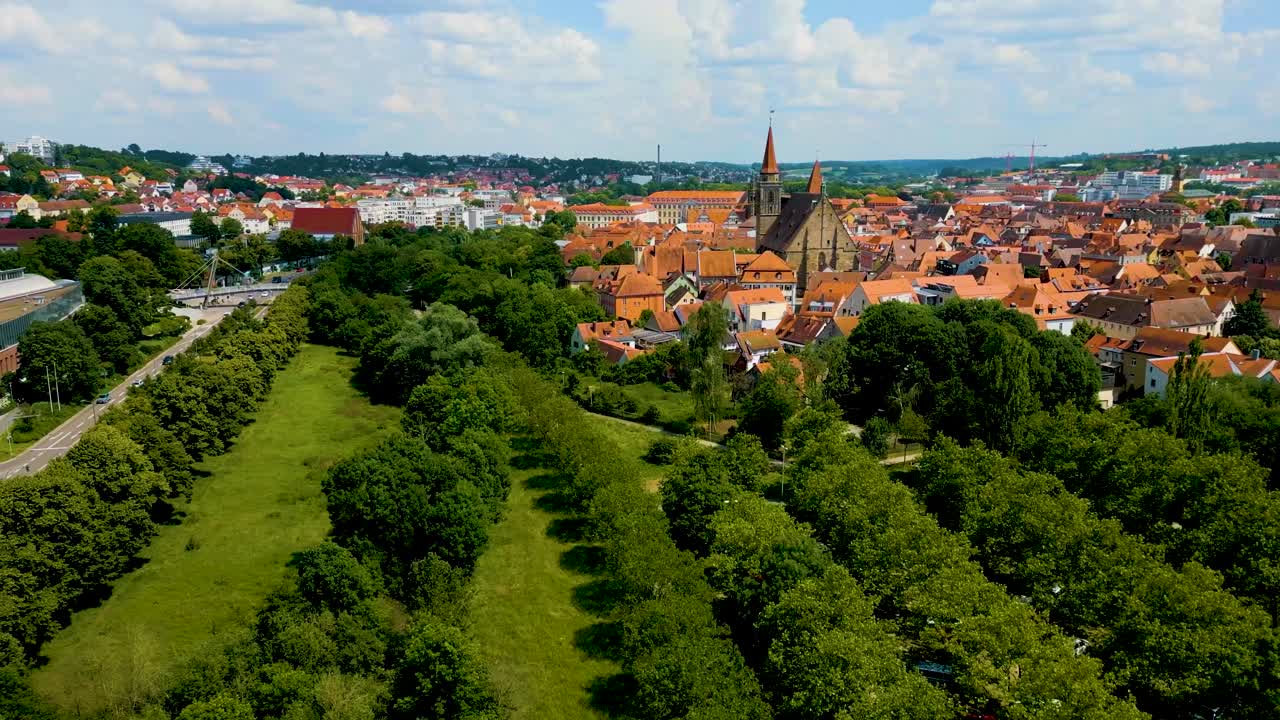 4K Aerial Drone Video of Rezatparkplatz West Parking Lot on the Frankische Rezat River in Ansbach, Germany