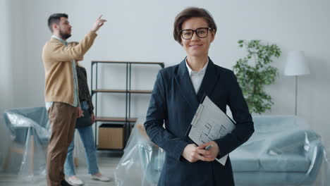 real estate agent with couple during home inspection