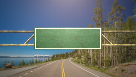 Road-sign-with-road-and-forest-in-daytime