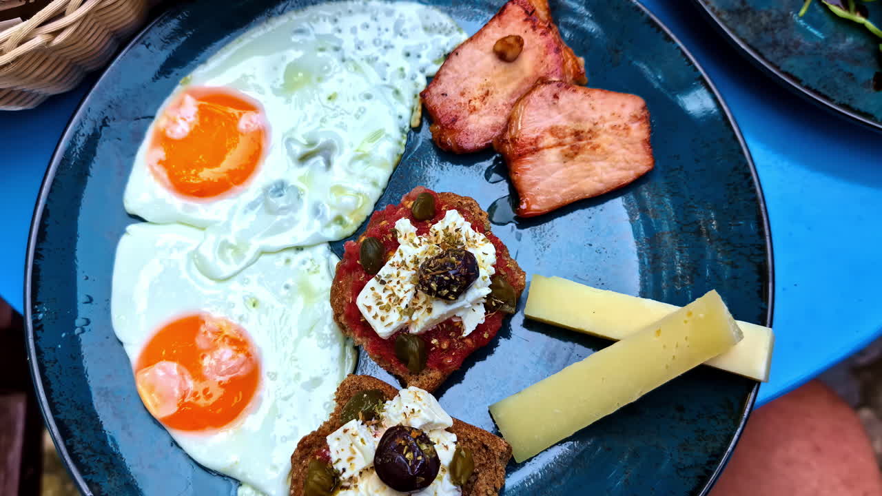 Delicious breakfast of eggs with cutlet