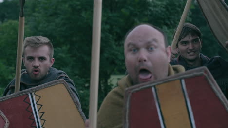 medieval reenactment soldiers in battle