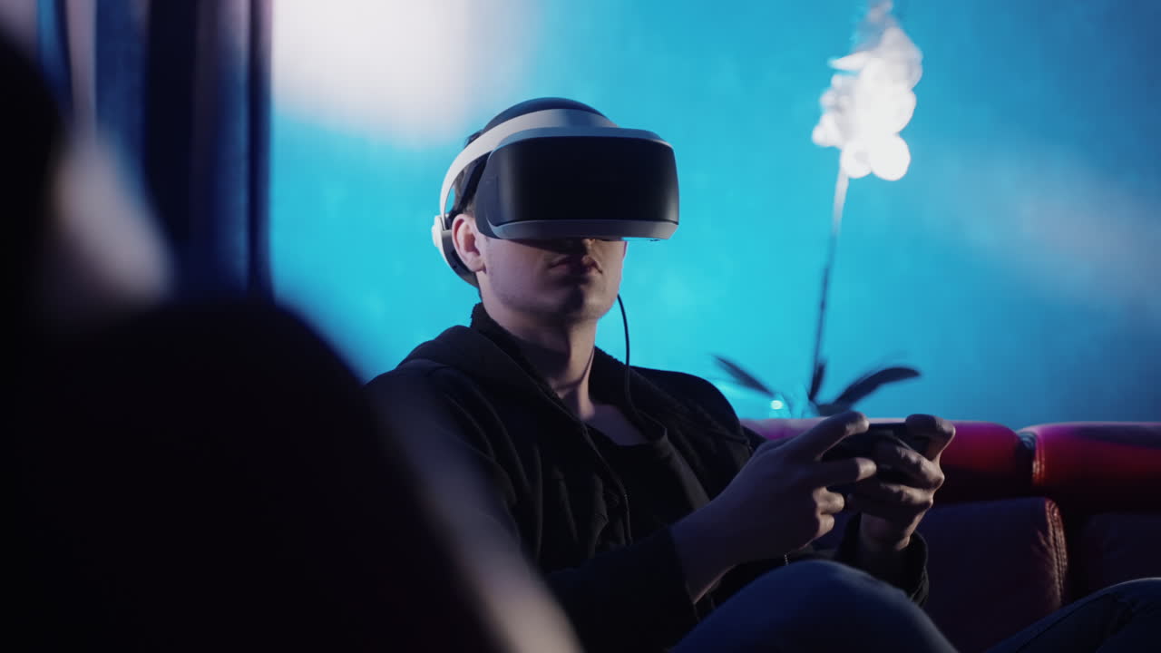 Man playing a VR video game at home