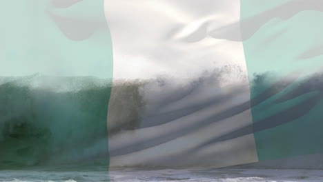 digital composition of waving nigeria flag against waves in the sea