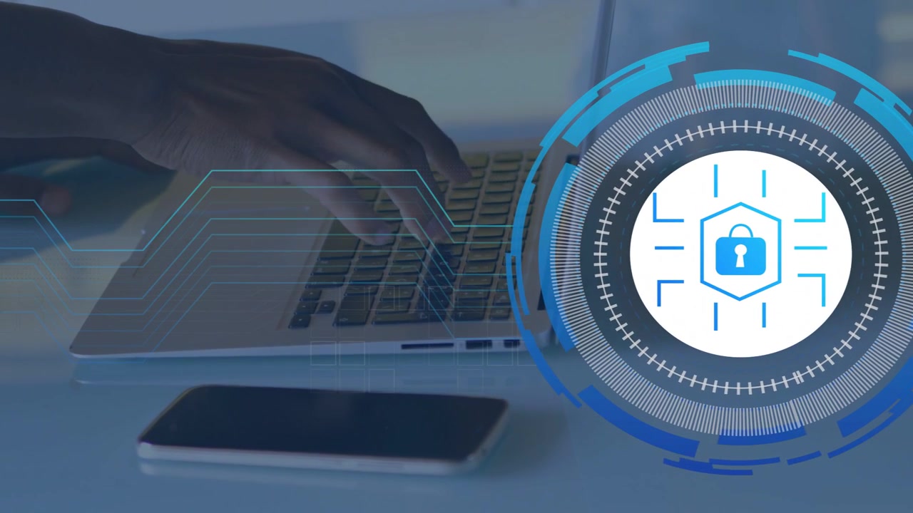 Male hand typing on laptop animating security HUD rings reaching keyboard securing data, phone idle