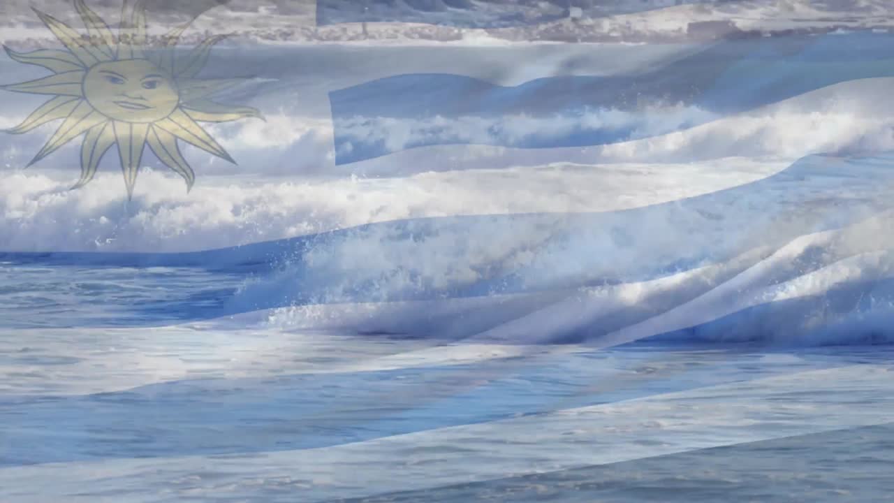 해변 해양 풍경 위에 날아다니는 우루과이 국기의 애니메이션