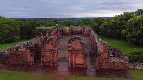 aerial orbit around corner of san ignacio historic ruins in argentina, south america