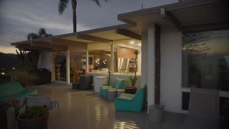 mid century moden home on the hillside of los angeles after the rain at dusk