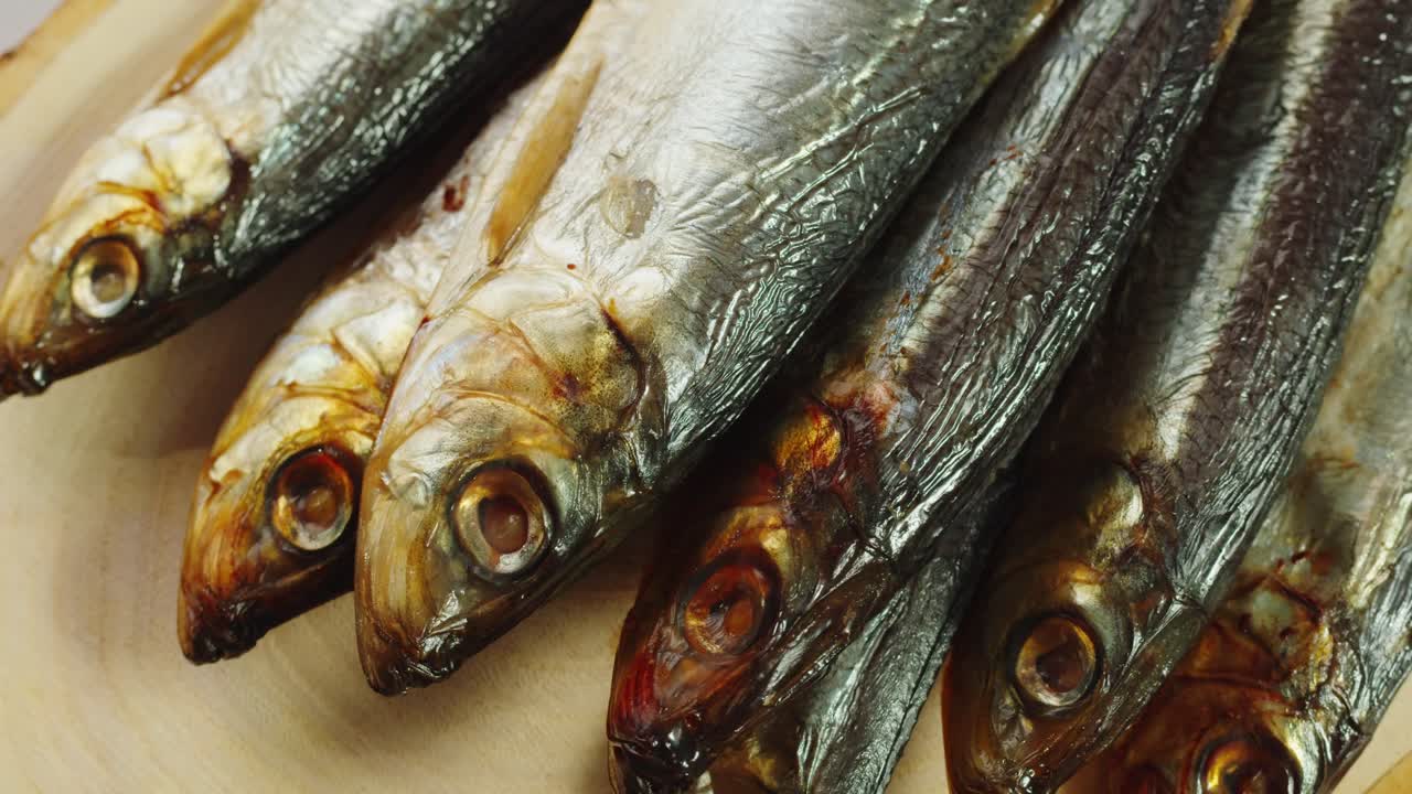 Smoked Herring on Wooden Board