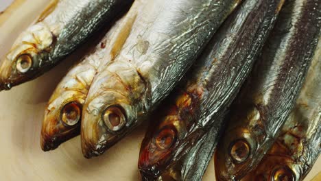 smoked herring on wooden board