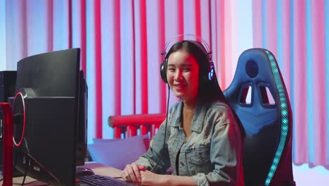 young woman gaming at home