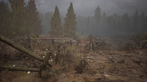 an old wood fence with a country field behind it