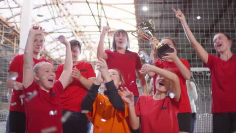 women football players celebrating after winning the championship