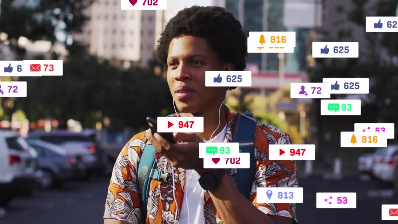 animación de iconos de los medios sobre un hombre afroamericano que usa un teléfono inteligente