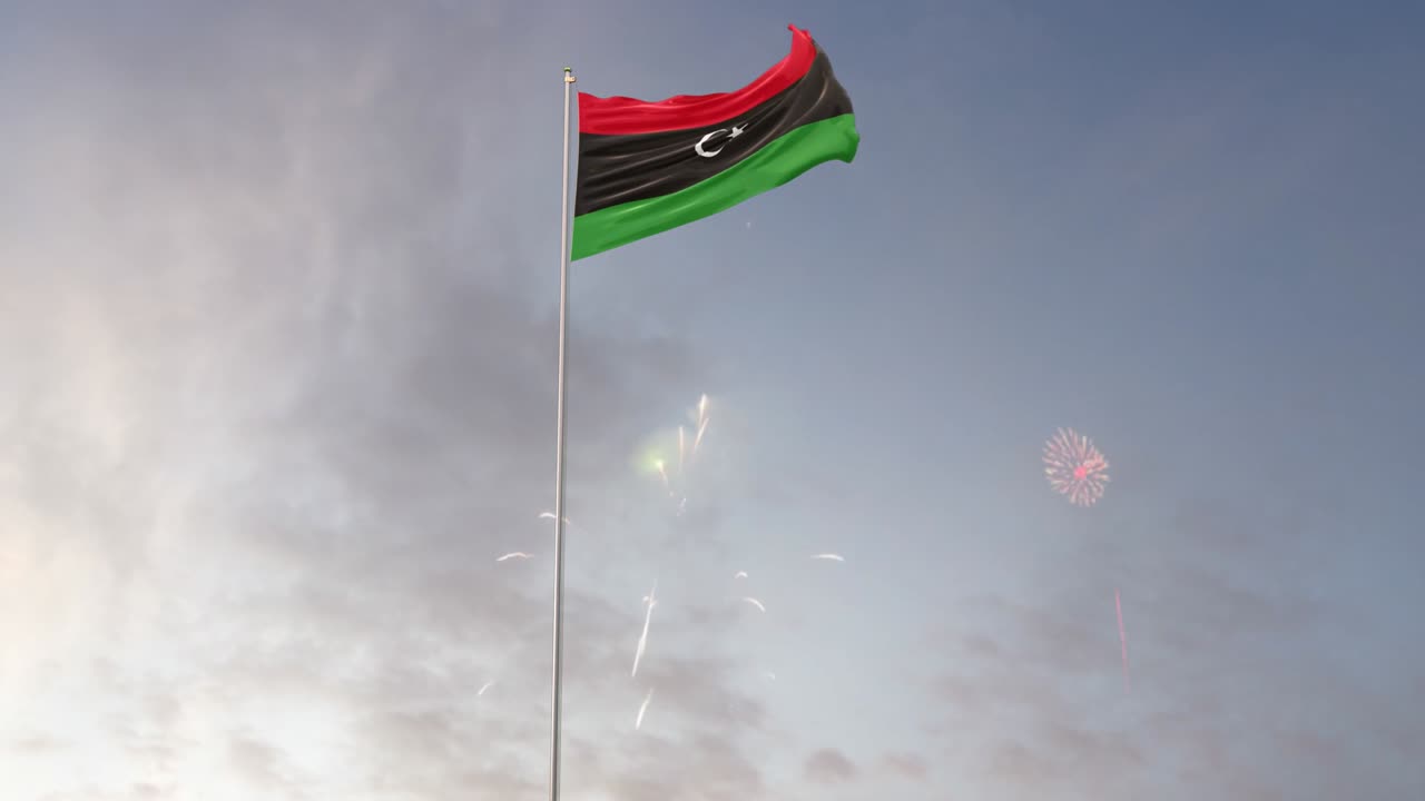 bandera de libia con fuegos artificiales en el fondo
