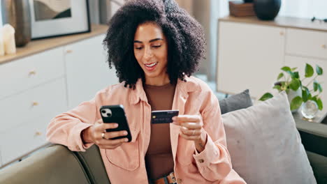 woman using mobile phone at home