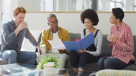 diverse group of male and female business colleagues working in office