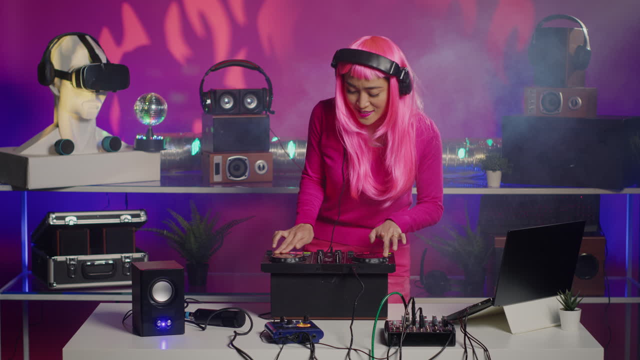 DJ Mixing Music with Pink Hair