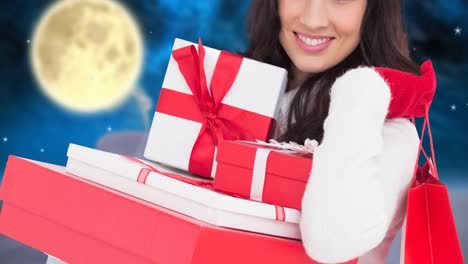 animation of happy caucasian woman keeping presents over winter scenery