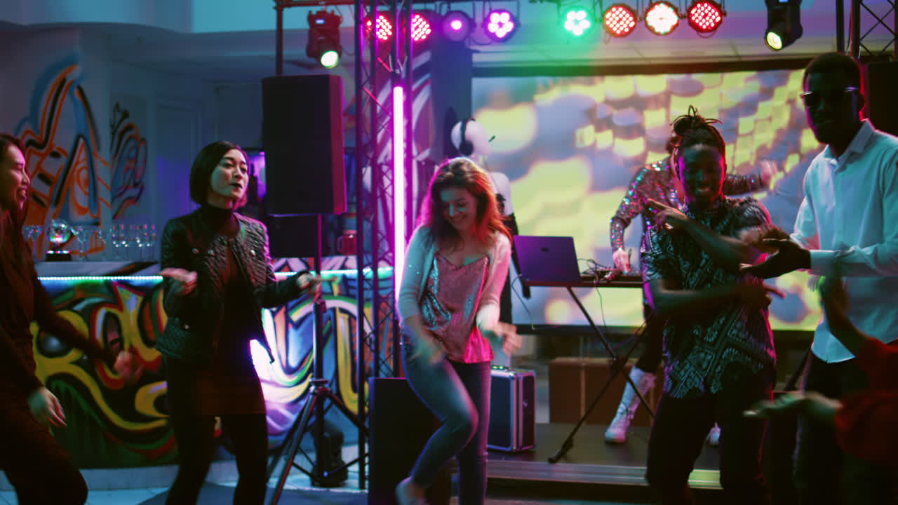 People Dancing at a Nightclub Party