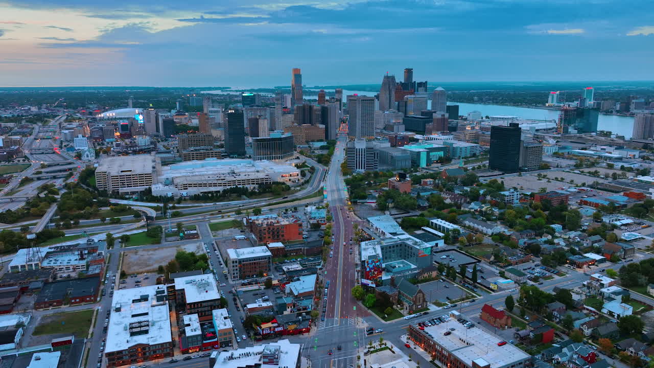 Detroit, USA, 28 July 2025: Avenue leading into downtown Detroit. Straight city avenue draws the eye toward the distant Detroit skyline