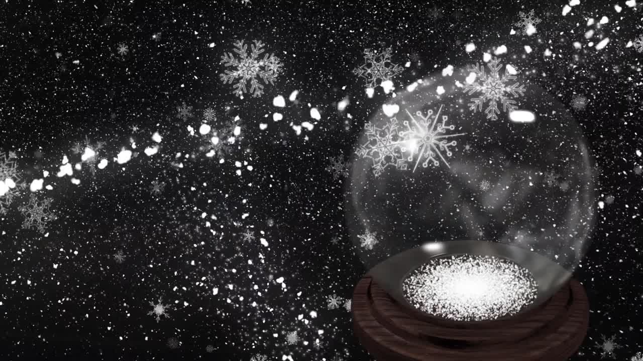 animación de la nieve y la primera estrella cayendo sobre el globo de nieve sobre fondo negro