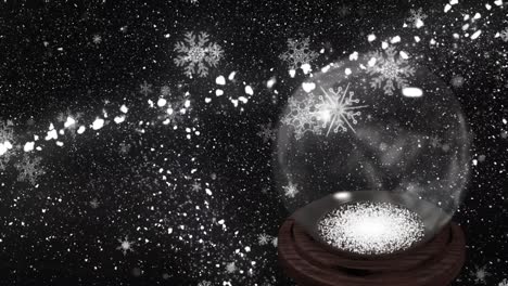 Animation-of-snow-and-first-star-falling-over-snow-globe-on-black-background