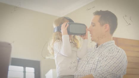 animation of mathematical drawings and equations over father and daughter wearing vr headsets