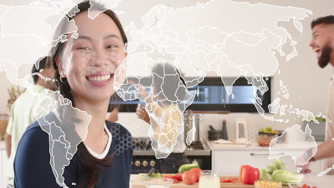 Cook stirring pan sparking group talking, group making food at island, world map overlay over group