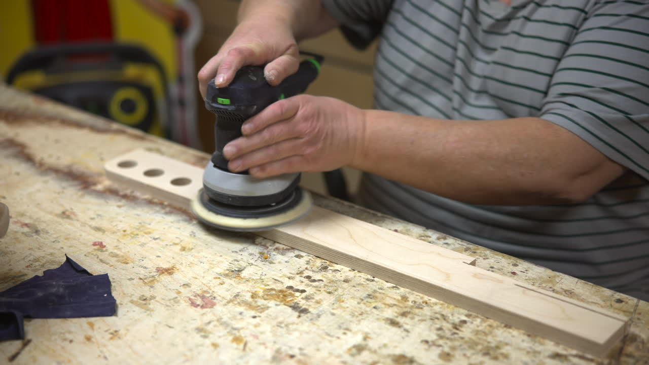 Orbital Sander Smoothing Long Panel Caucasian Finisher Applying Even Pressure For Consistent Surface, Workshop. Media