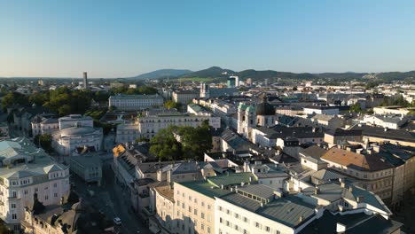 cinematic drone shot above salzburg, austria on beautiful summer day