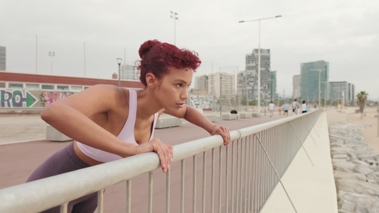 Fit Woman Doing Incline Push Ups at Beach