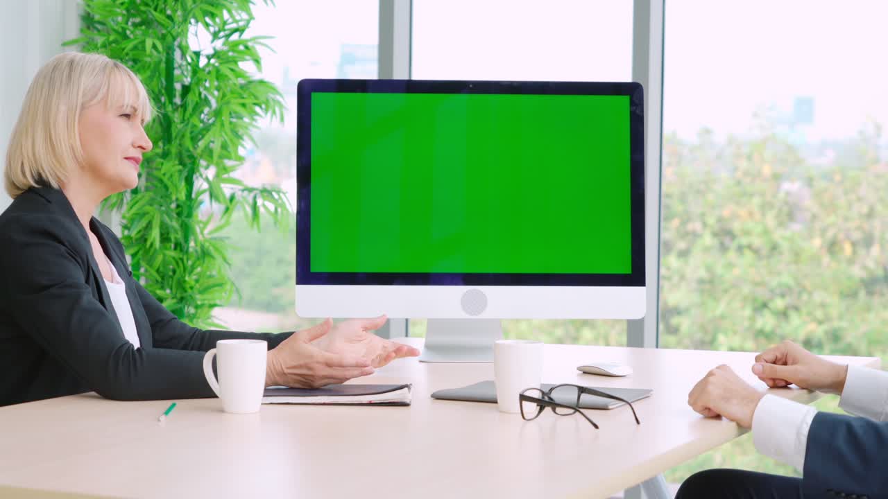 Business people in the conference room with green screen