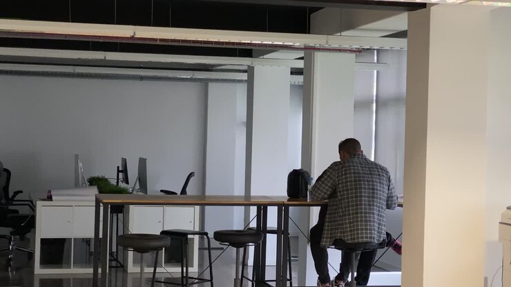 Two Colleagues have lunch together and share some ideas of their Project