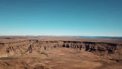 Fish-River-Canyon-in-Namibia,-Africa-Aerial-Drone-Shot