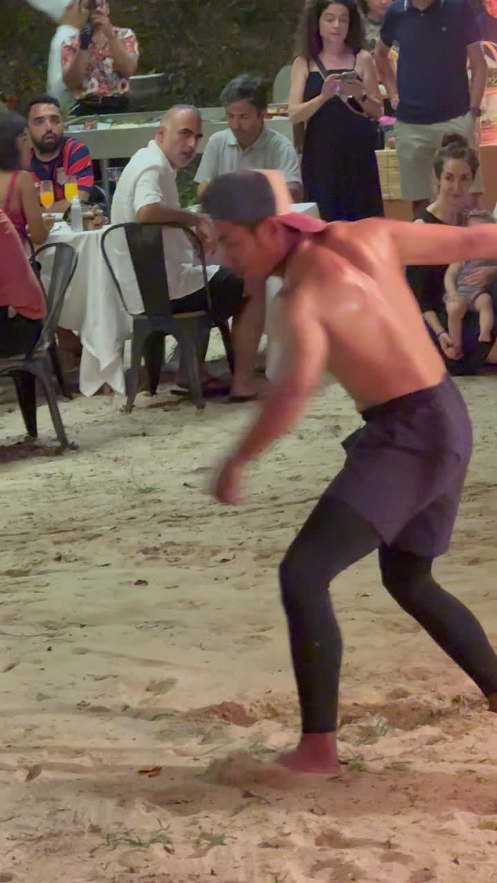 Fire dance performance on the beach