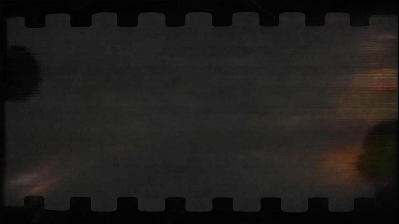 Vintage-Filmrahmen mit farbigen Lichtlecks und Glitch-Effekten