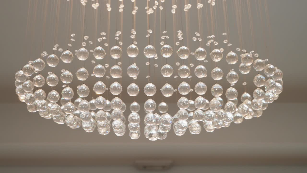 Elegant chandelier with cascading crystal droplets creating a luxurious sparkling effect