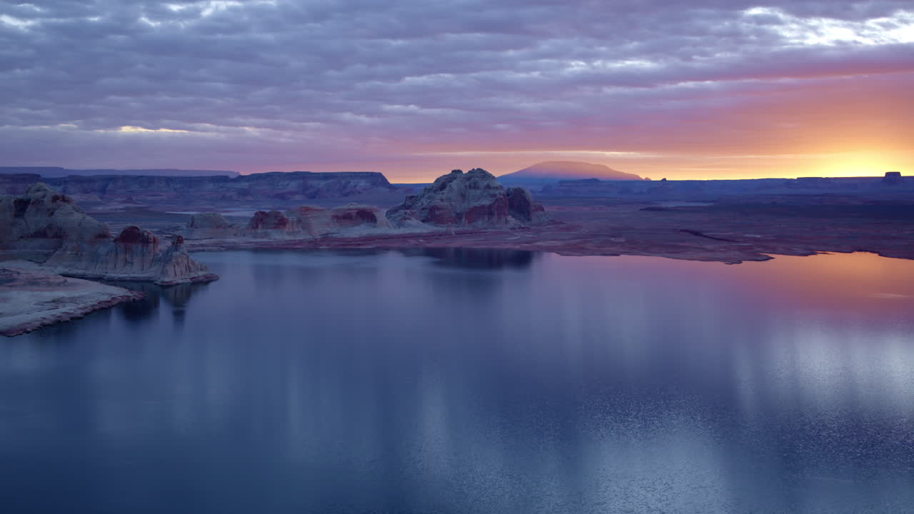 The sweeping drone footage unveils the beauty of Glen Canyon’s erosion-sculpted landscapes near Page, Arizona.