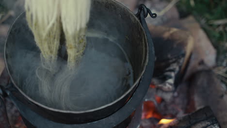 dyeing wool by campfire