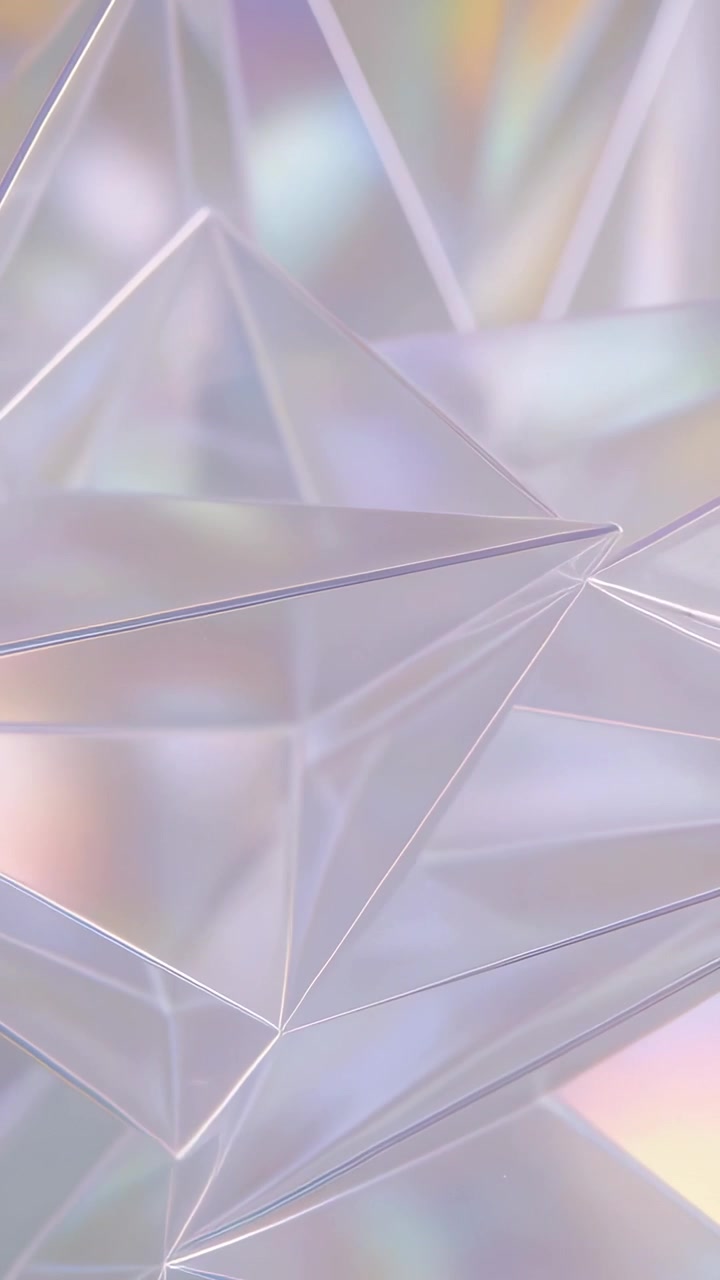 Vertical video: Shifting camera showing prism facets sliding across macro set, specular pastel glow