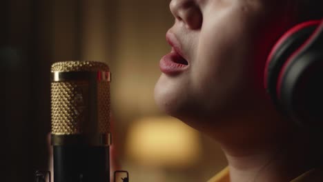 female vocalist in recording studio