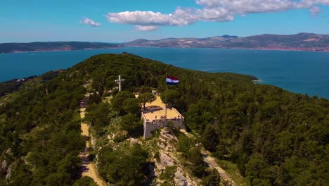 4k fast arc shot around marjan hill in split, croatia