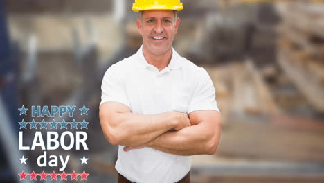 animation of happy labor day text over smiling caucasian man in yellow hard hat